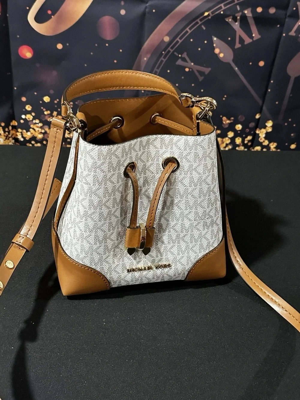 Michael Kors White & Tan Monogram Mini Drawstring Bucket Bag